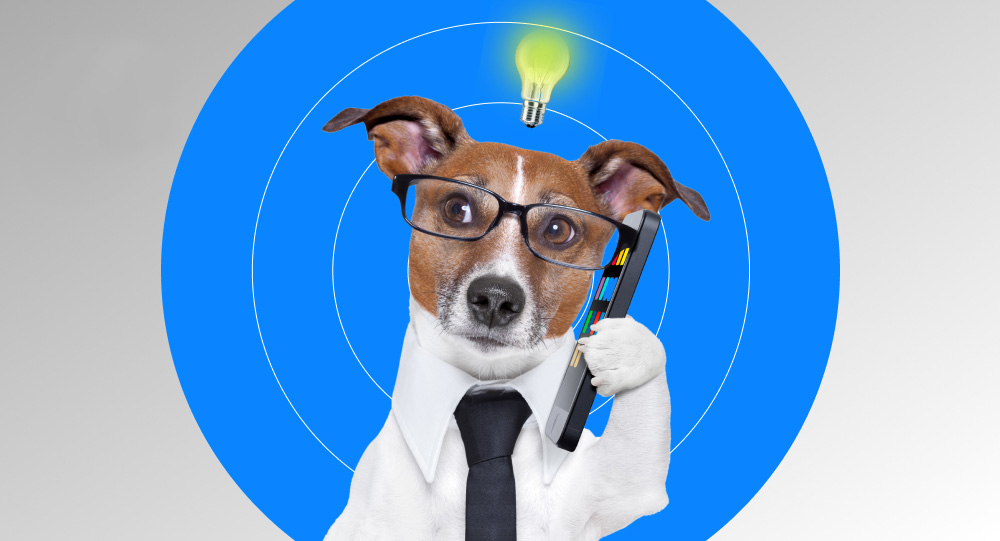 Dog with a phone and a bulb above the head